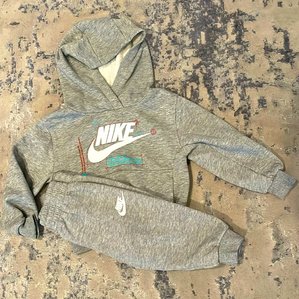 Nike grey set sweater and pants. Fits for 12-18month labeled as 24 month.